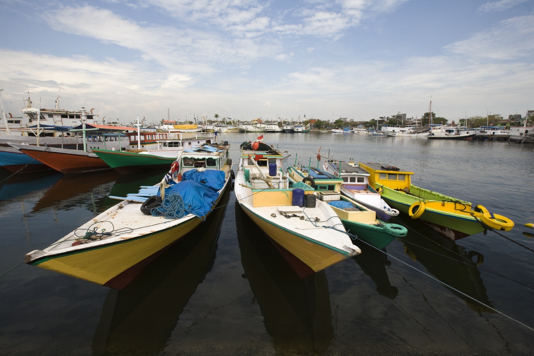 Makassar schooners (pinisi) in Paotere harbor, the old port of Makassar, Indonesia